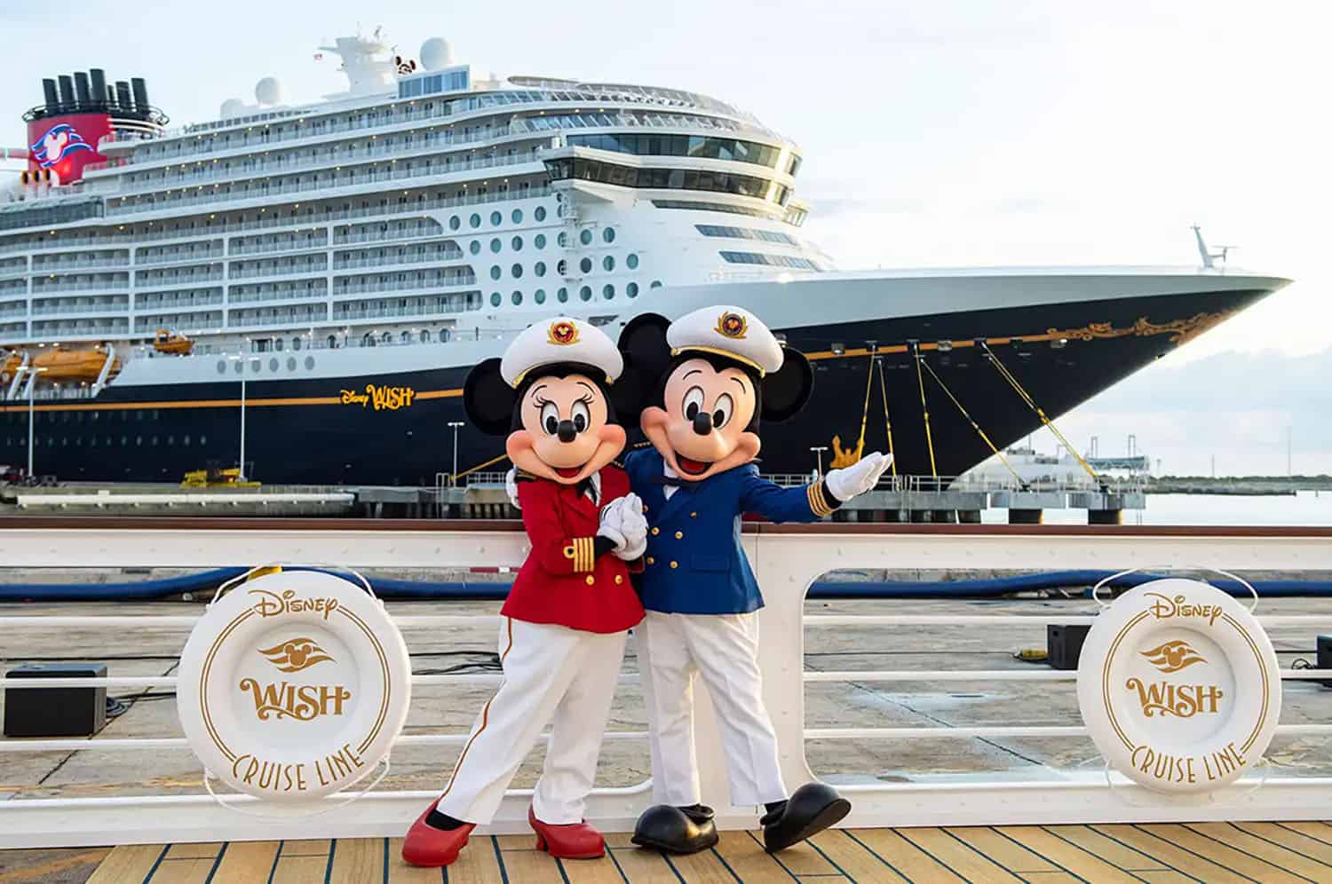 Disney Cruise Line - Mickey and Minnie pose in front of the Disney Wish