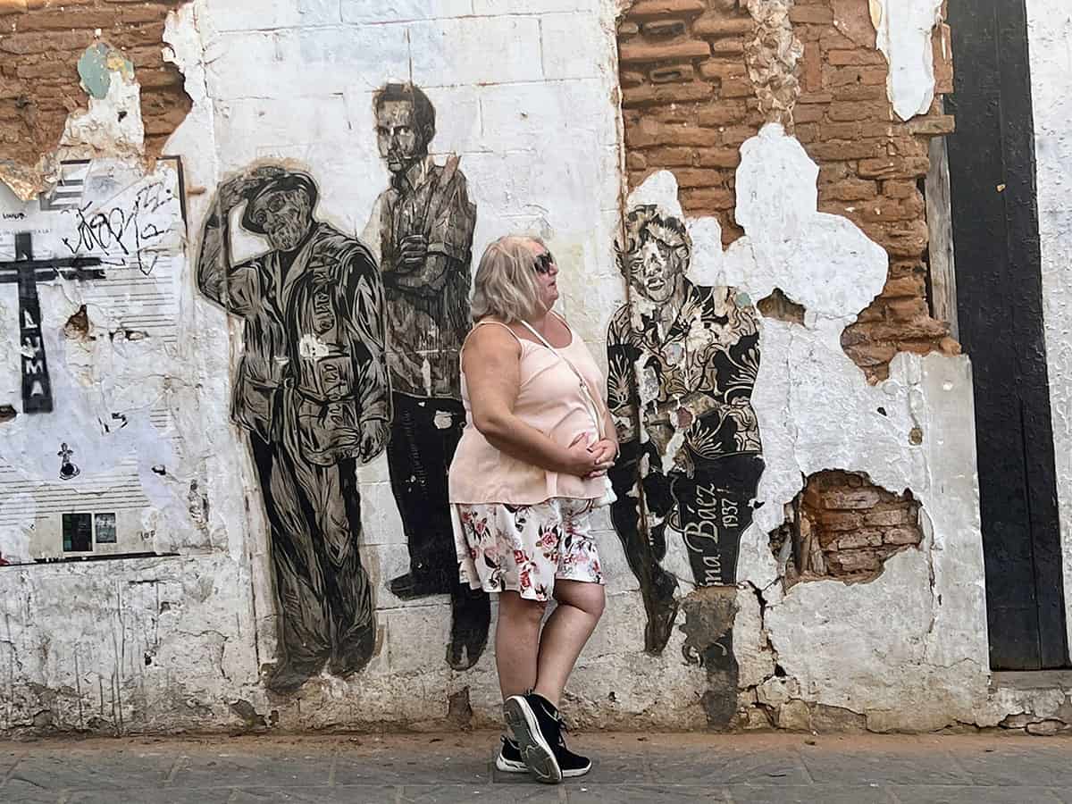 Morag standing in front of mural in Puerto Rico