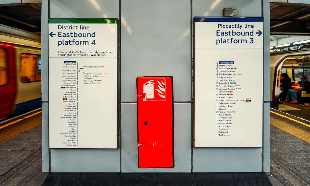 Tube Directions signs with destinations on London Underground